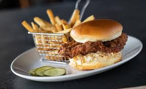 Yard House signature dishes Nashville Hot Chicken Sandwich, Korean BBQ Cheesesteak, Kurobuta Pork Burger, Mac and Cheese